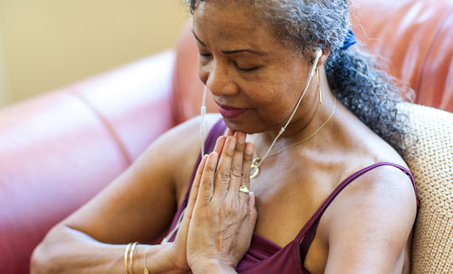 mature woman meditating